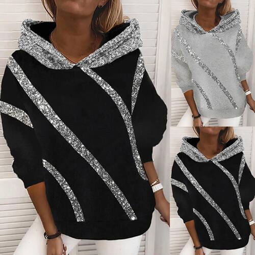 Printed loose long sleeved hooded sweatshirt宽松长袖连帽卫衣