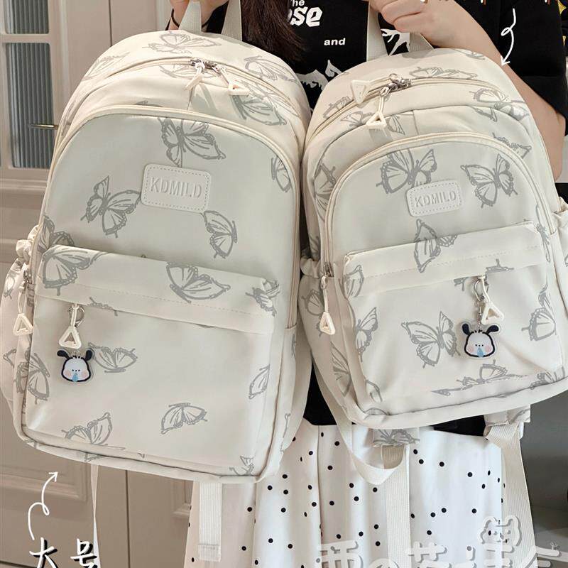 高颜值反光蝴蝶双肩包ins风初中女生高中学生书包大容量旅行背包