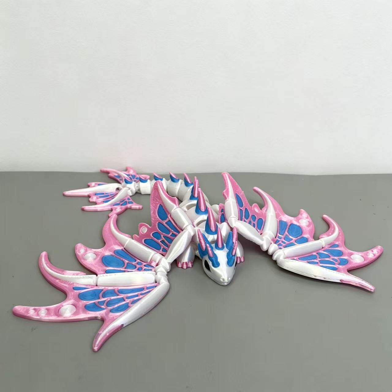 3D打印粉蓝帝王龙翅膀可动摆件