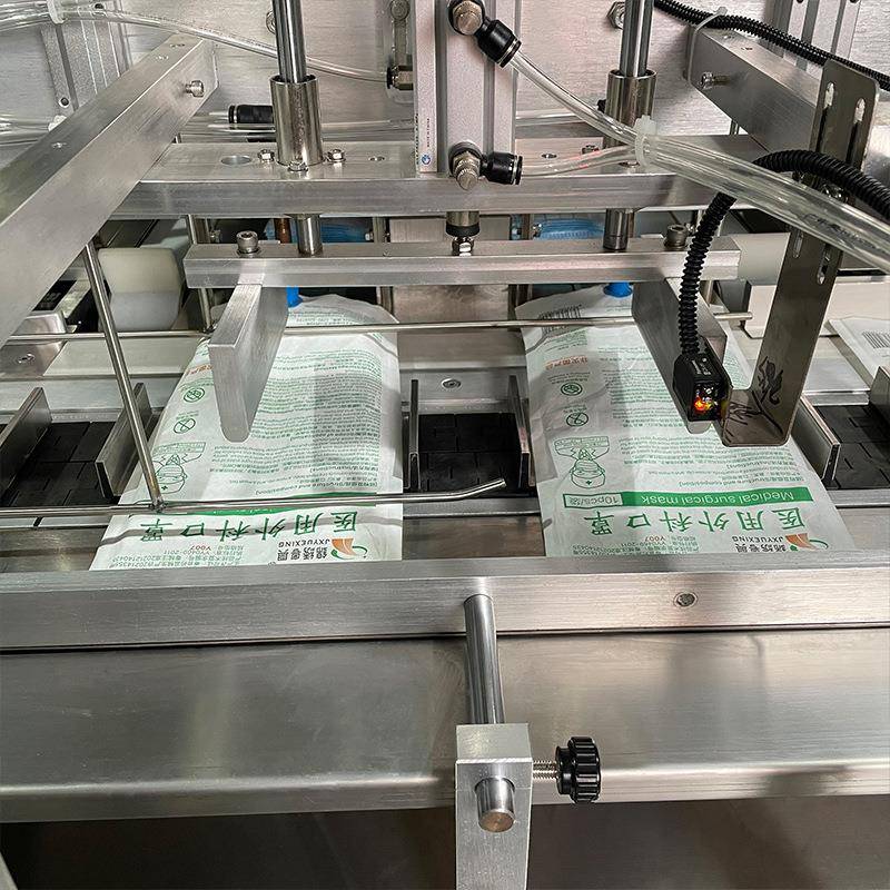 气垫粉扑包装机三角形海绵美妆蛋装袋包装机高速粉扑套袋包装机