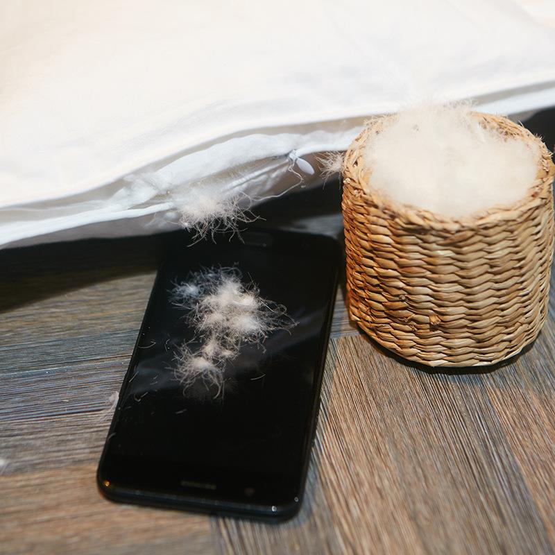 全棉扭宿花羽绒枕芯白鸭绒立纯色枕柔软羽绒枕体酒头店民家用