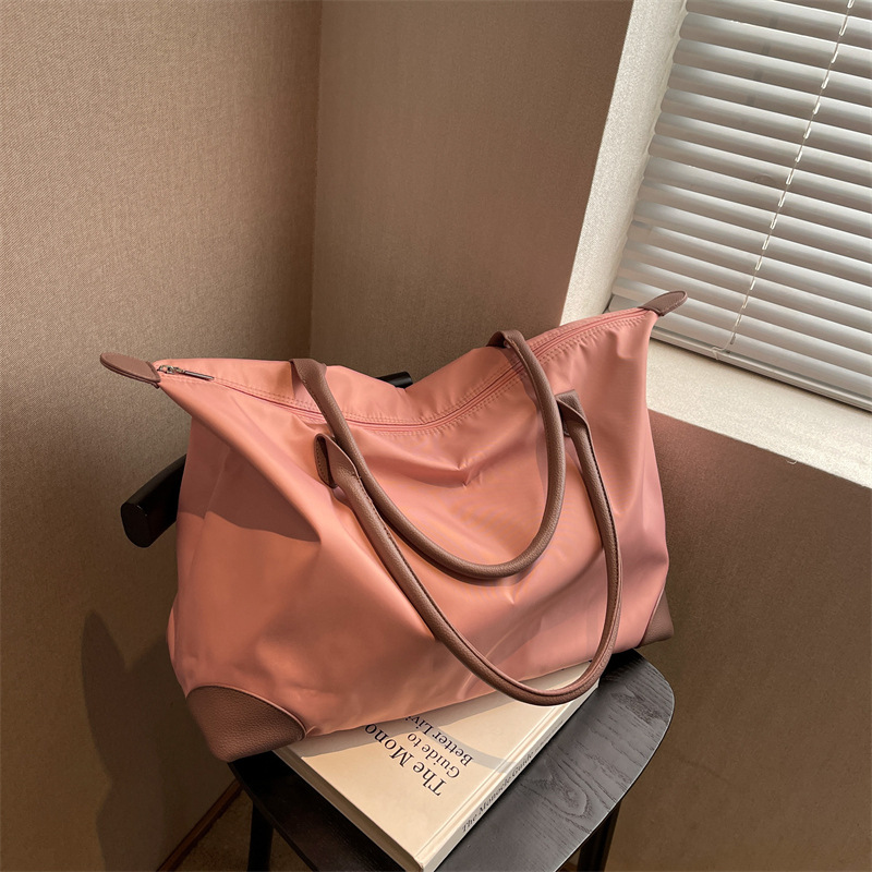 待产包手提袋通勤包女高级感手提旅行饺子包防水单肩大容量妈咪包