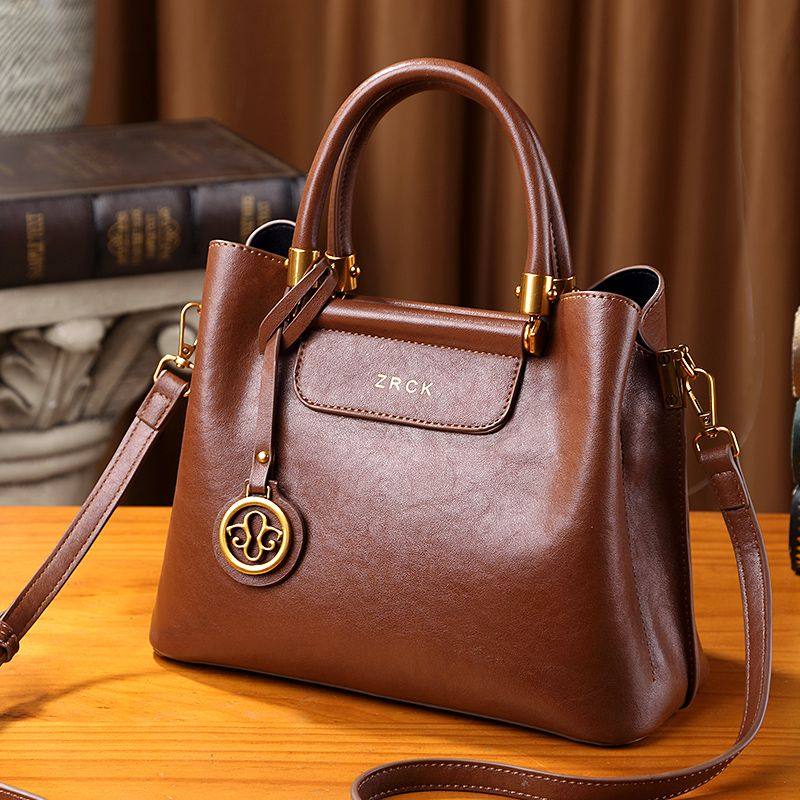 真皮手提包女2025新款女士高档百搭大容量复古简约牛皮单肩斜挎包,箱包皮具/热销女包/男包,手提箱,淘宝优惠券,粉丝福利购,淘宝优惠卷