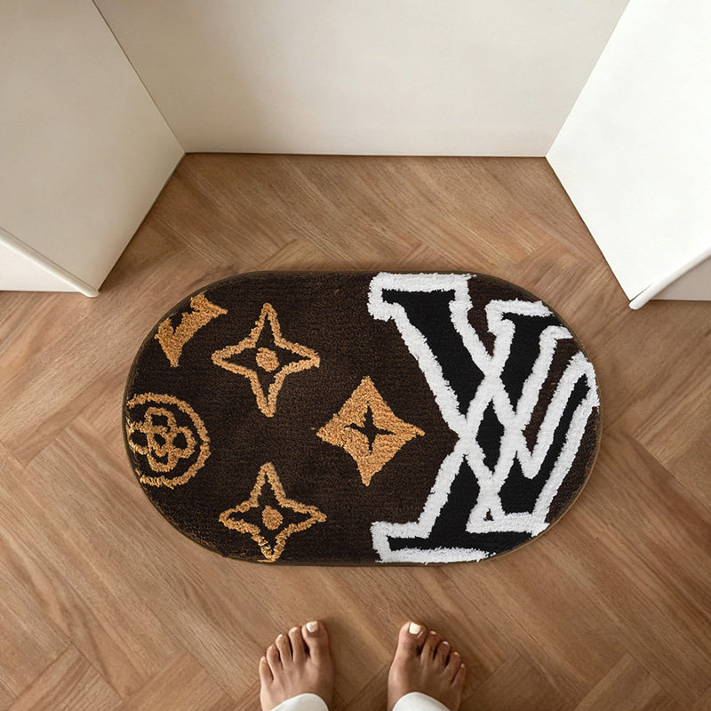 轻奢潮牌风簇绒地毯经典标识图案入户垫高级黑金配色家用卧室脚垫