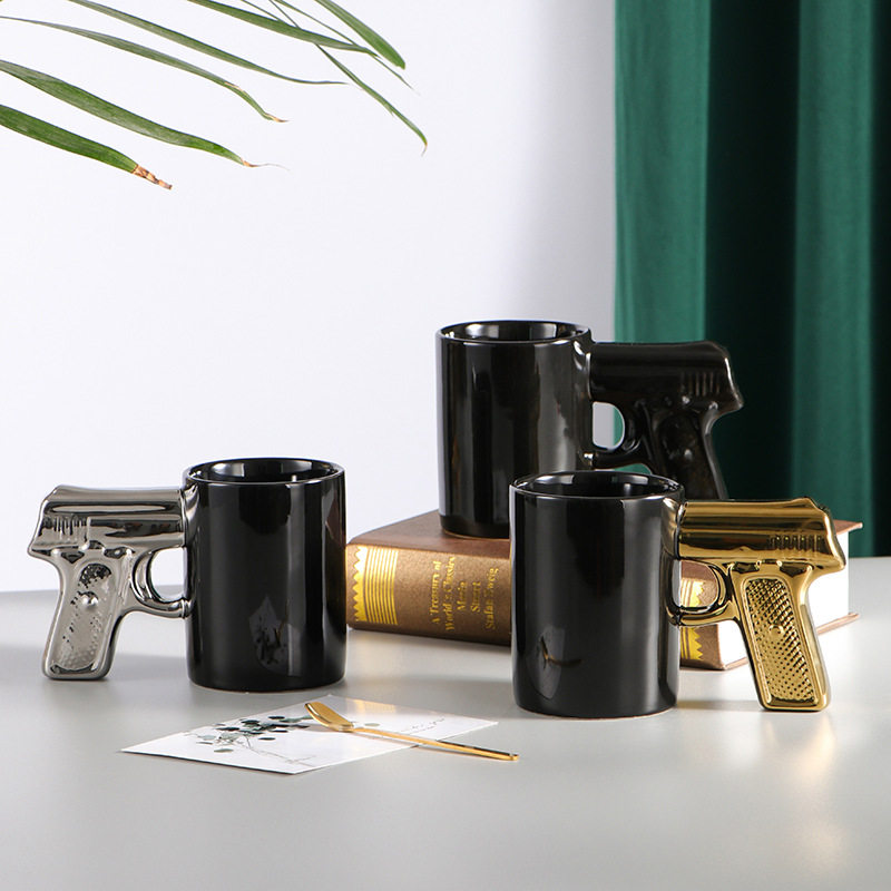 创意陶瓷杯金银色手枪把