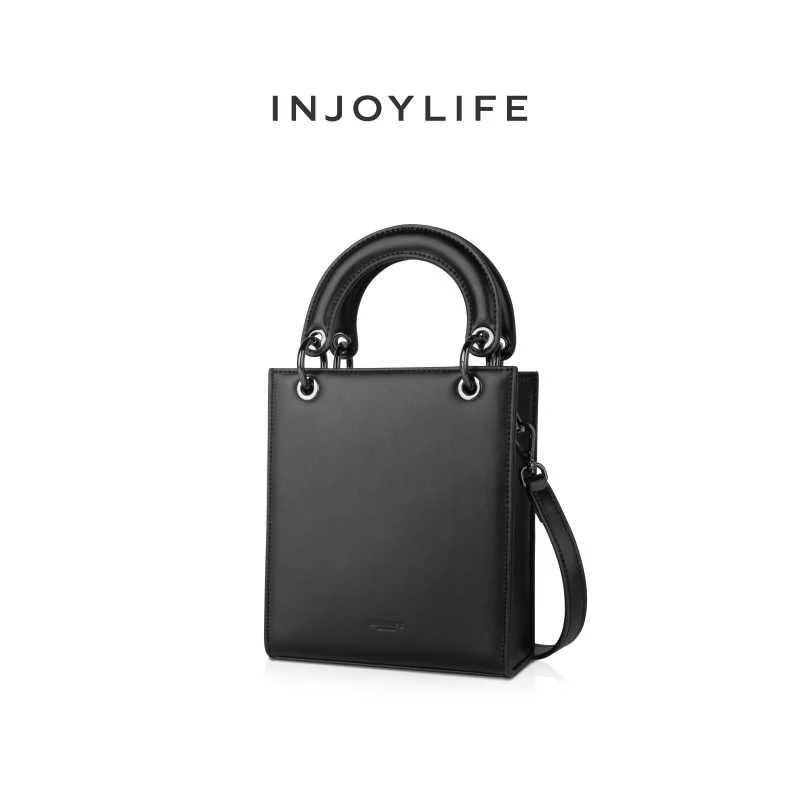 INJOYLIFE春夏新款圆环小小手提包众设计单肩斜挎包女琴谱包新品