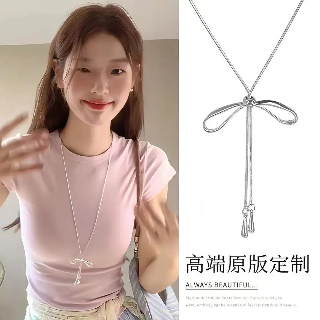 甜美简约抽拉蝴蝶结项链女韩系小众设计长款配饰百搭2026春夏款lx