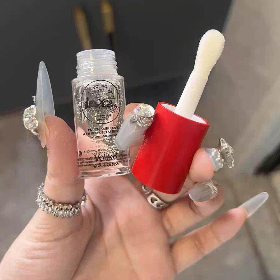 冷门但巨润！番木瓜唇部精华油保湿滋润唇膏防干裂女学生护唇油蜜,彩妆/香水/美妆工具,唇彩/唇蜜/唇釉/唇泥/唇霜,淘宝优惠券,粉丝福利购,淘宝优惠卷