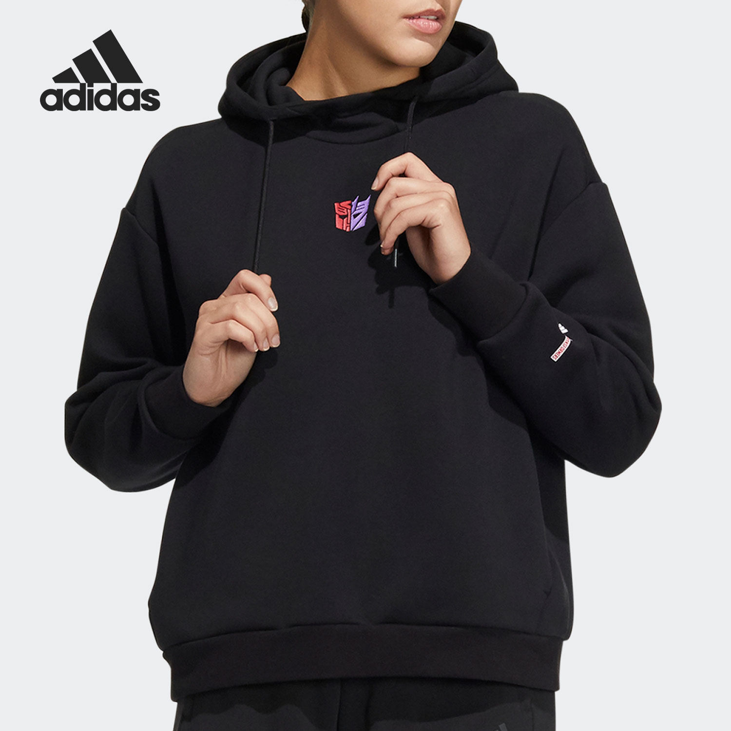 Adidas/阿迪达斯正品当季变形金刚联名女子连帽卫衣HM7459