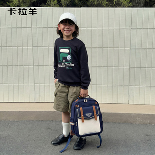 卡拉羊书包大容量男童小学生减负防脏护脊双肩包儿童专用新款背包