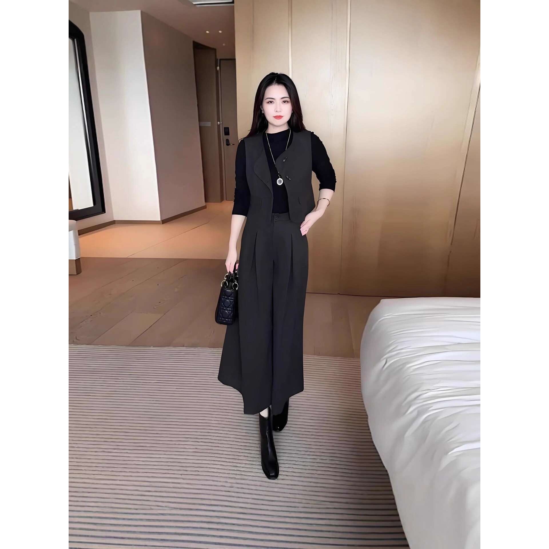 流行时尚套装女士秋季新款不规则无袖马甲修身打底衫阔腿裤两件套