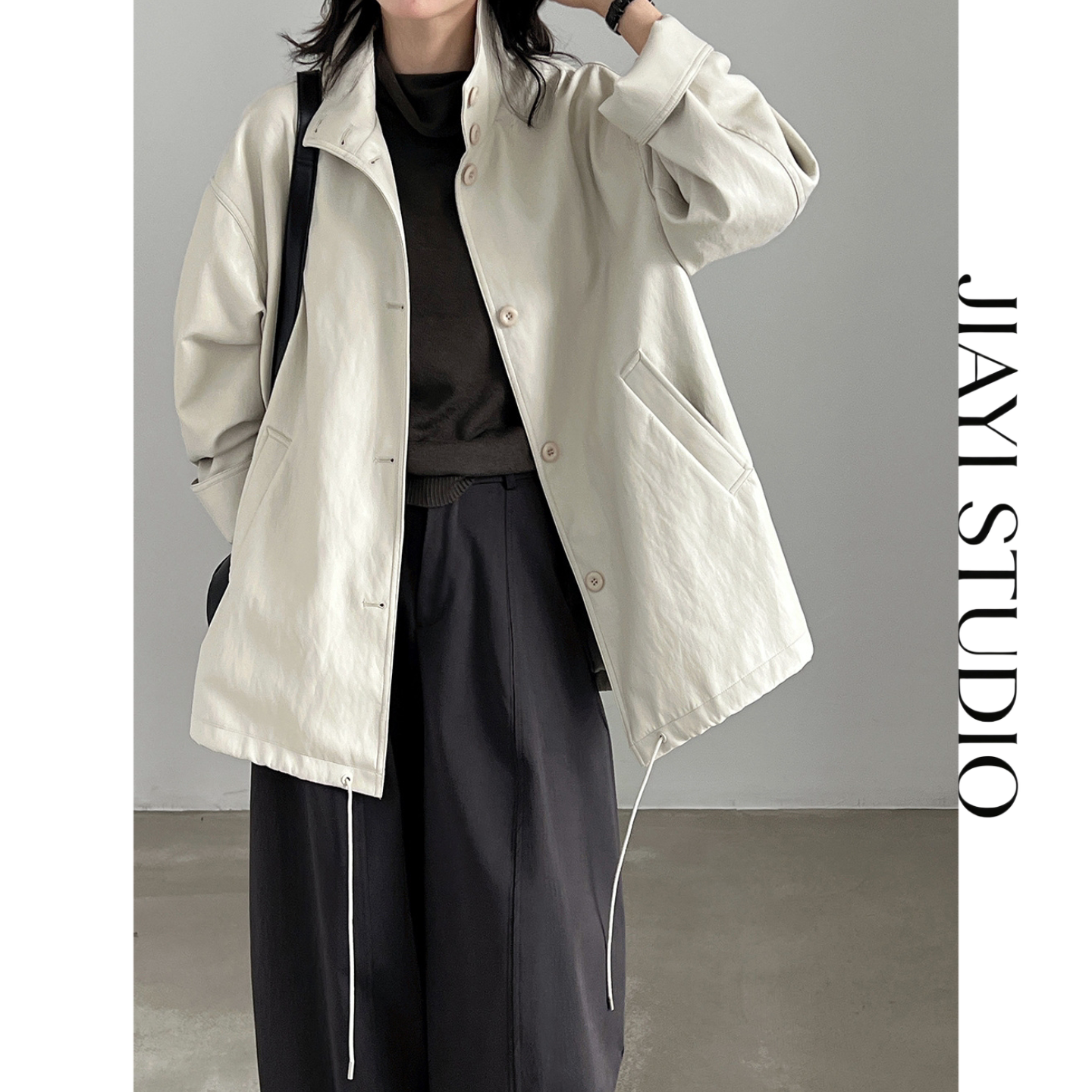 JIAYI STUDIO立领PU皮质抽绳收腰中长风衣女秋松弛感小众落肩外套