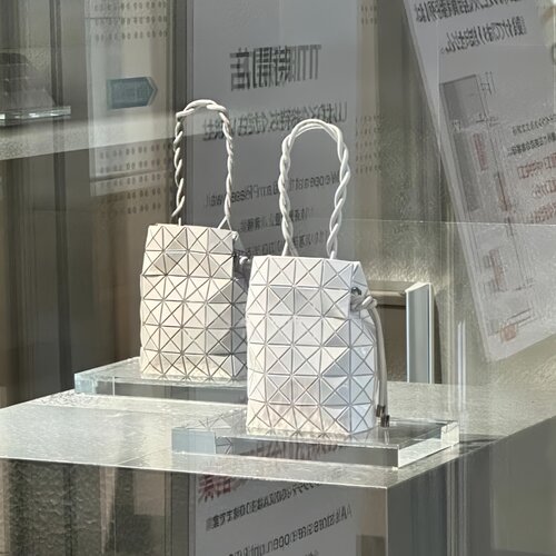 日本几何菱格抽绳手提包女立体小方包水桶包单肩斜挎包小众设计感