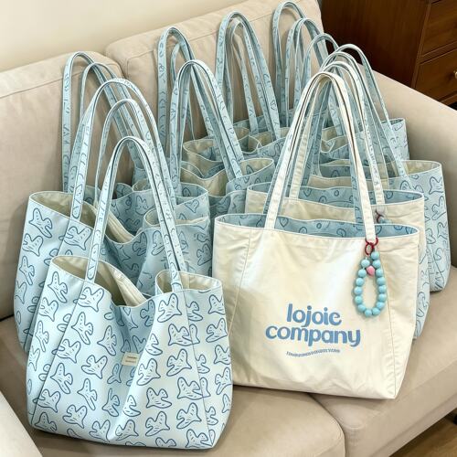 蓝色小鸟托特包大容量女帆布包韩系通勤上班轻便双面包小众单肩包