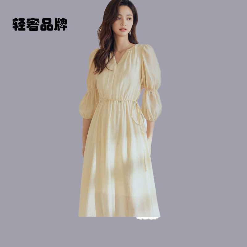 朗姿约定优雅气质灯笼袖连衣裙2026秋季新款度假风浅鹅黄大摆裙