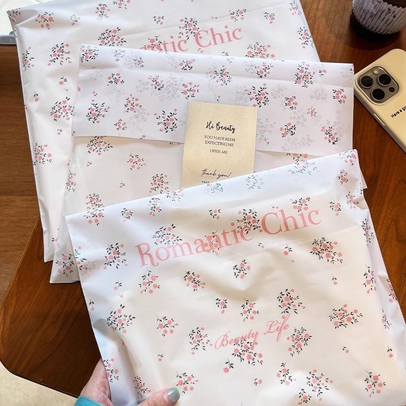 速发高档服装店碎花平品磨砂带料袋礼口包装打包塑装衣服袋子