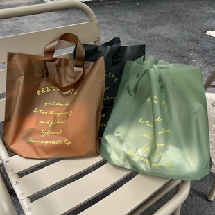 衣服礼品服物磨砂塑店包装 料手提袋装 衣服袋子logo 购装 速发装