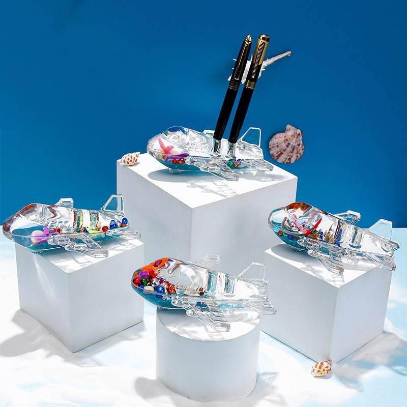 海洋世界流动水液体油滴摆件创意飞机老爷车轮船模型笔插学生礼品