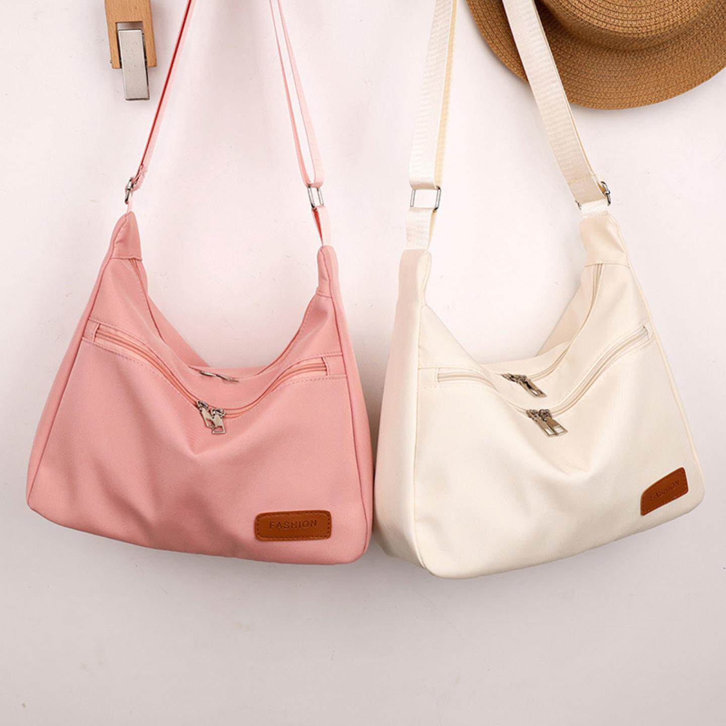 尼龙斜跨包女2025新款单肩包轻便小挎包学生女包休闲包帆布饺子包