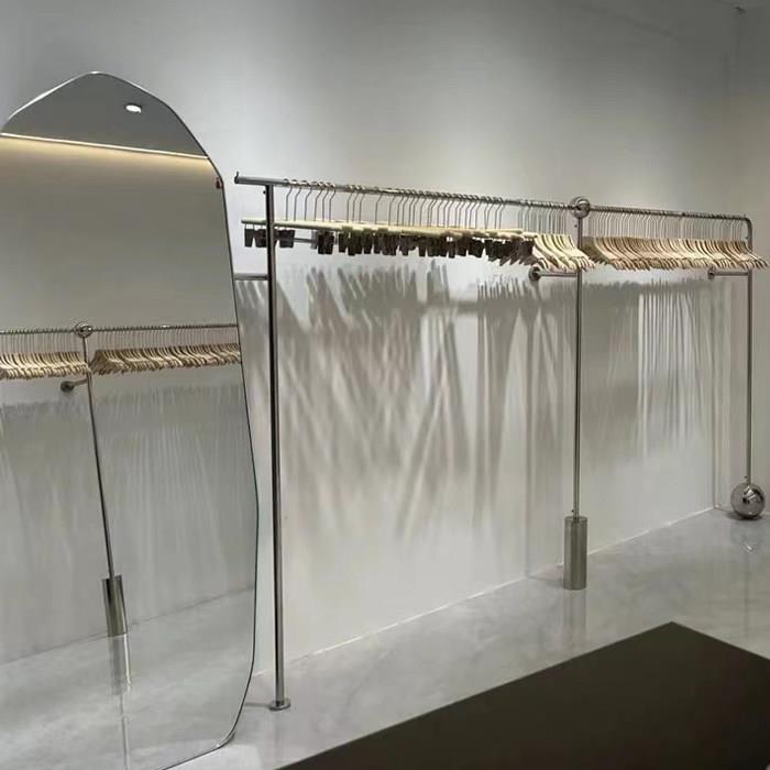 童装店不锈钢拉丝展示架服装店男女装挂衣架上墙壁挂架轻奢挂衣杆