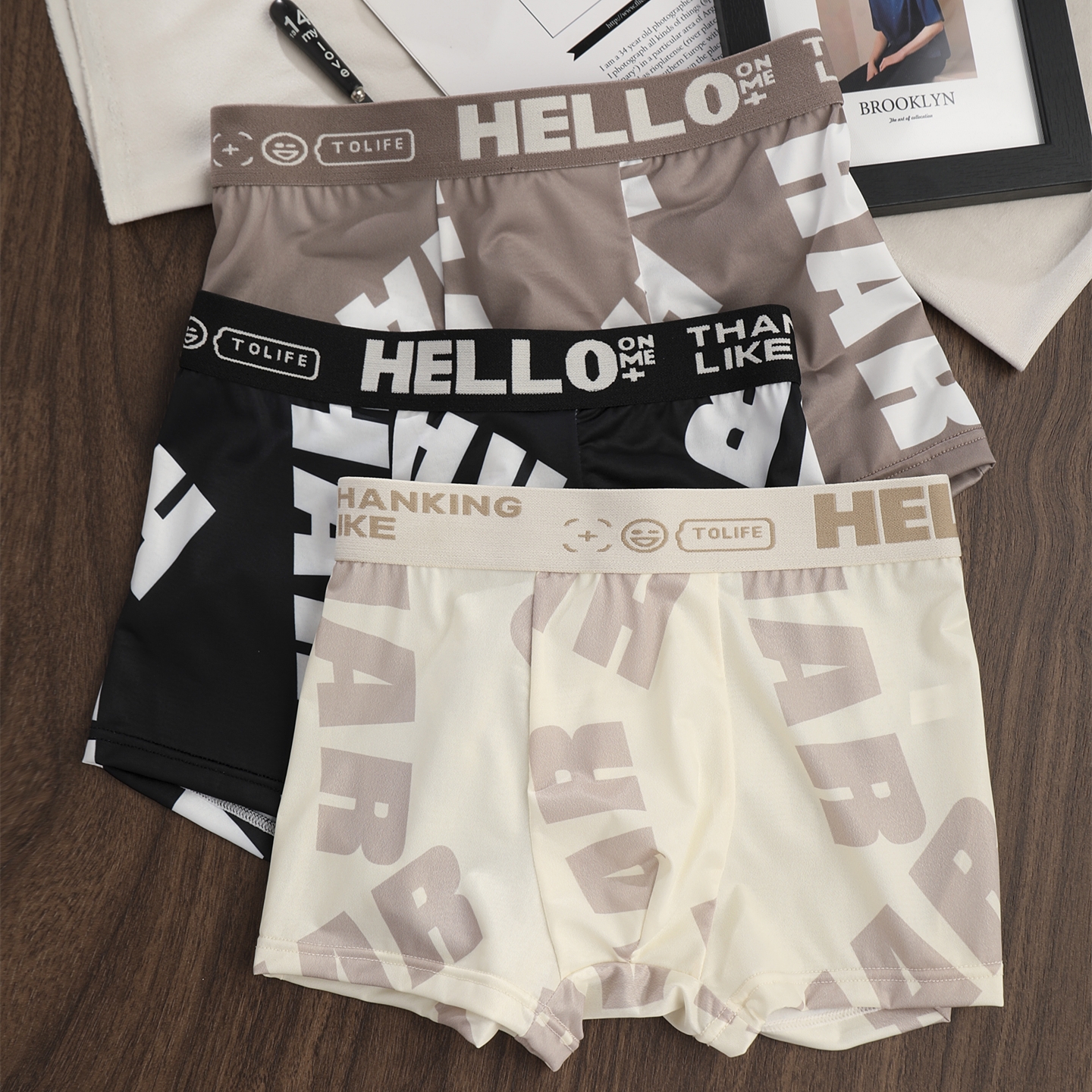 男士冰丝内裤男夏季薄款凉感透气青少年中腰四角裤个性印花平角裤