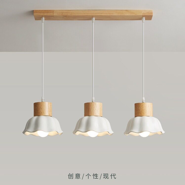 餐厅灯日式实木餐桌三头吊灯2022年新款北欧ins风吧台灯简约现代