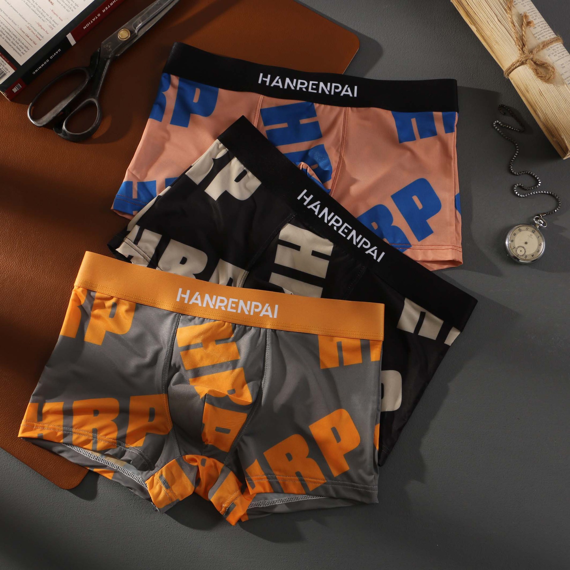 男士内裤印花内裤男新款冰丝中腰运动透气印花青少年内裤平角裤