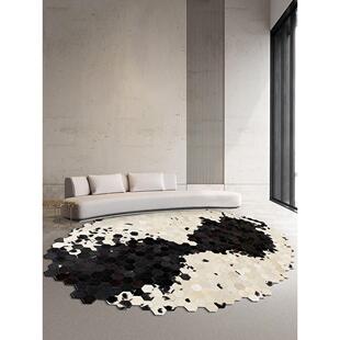 不规则牛皮拼接椭圆形地毯现代轻奢高级黑白客厅茶几垫异形可定制