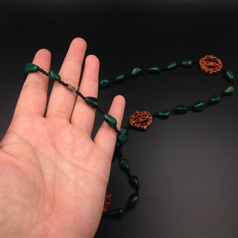 极速VINTAG日本复古镂空核桃雕刻墨绿色松子串珠长项链毛衣链首饰