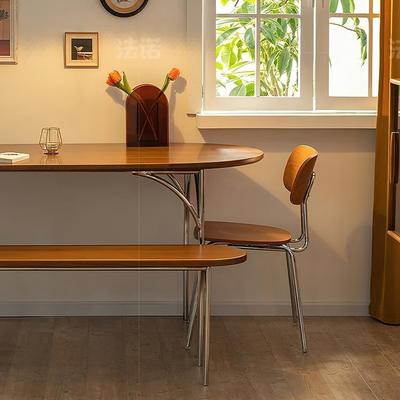 直销新款中古风实木餐桌椅组合不锈钢桌腿复古小户型椭圆形饭桌子