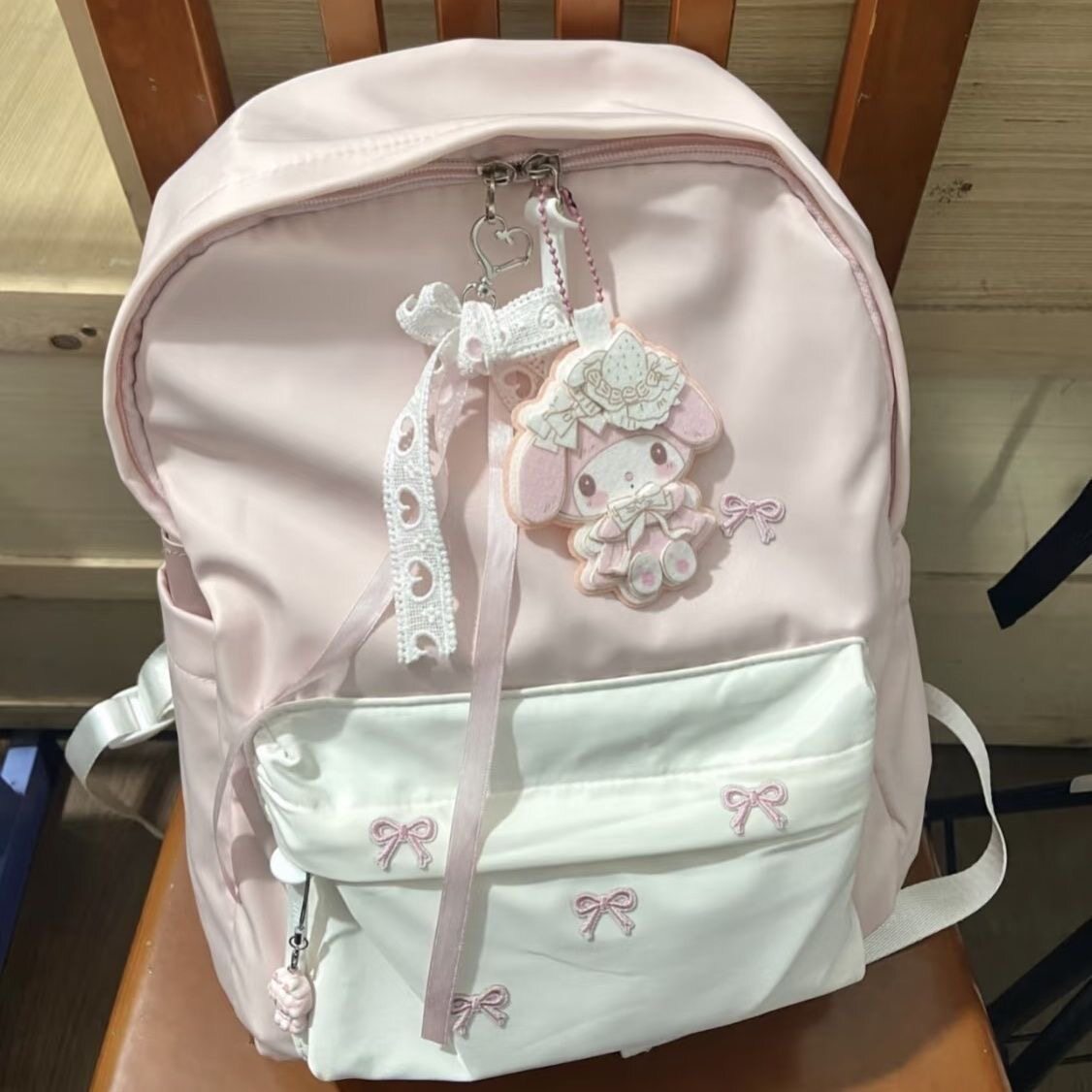 学生书包可爱初中少女蝴蝶结双肩包百搭大学生简约高颜值背包