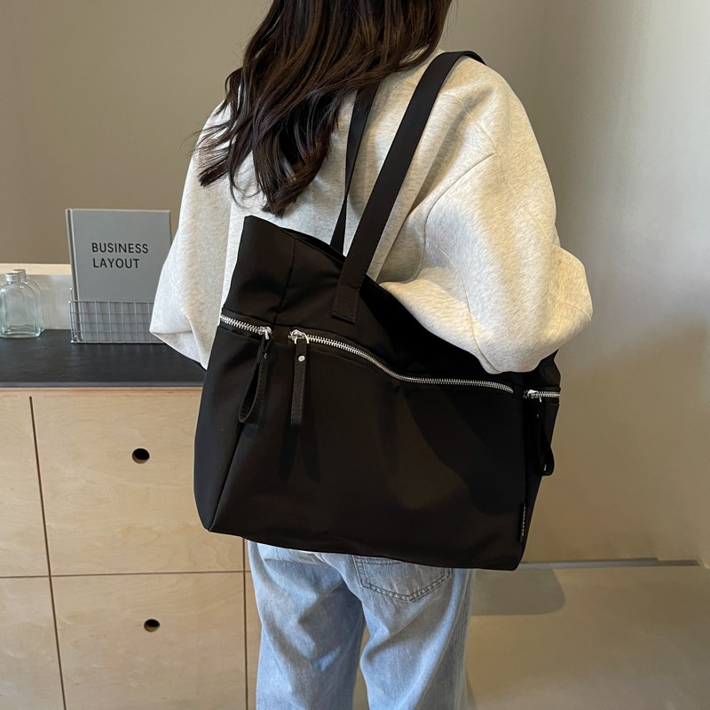 帆布包女2025年新款上班手提袋学生上课大容量单肩包通勤小众挎包