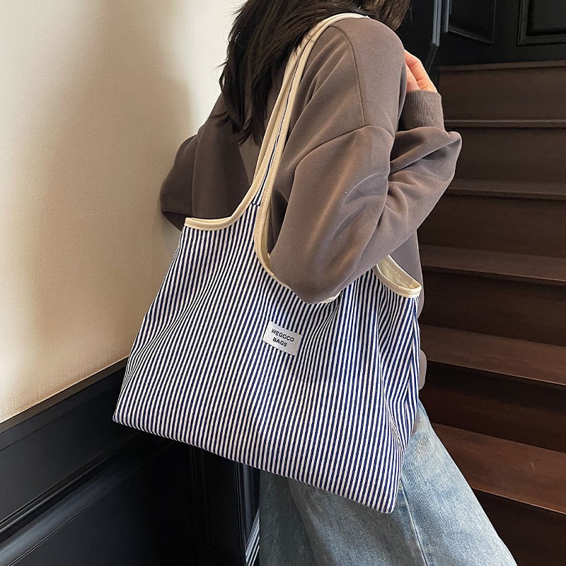 慵懒风条纹大容量帆布包女2025新款时尚腋下通勤包百搭单肩托特包