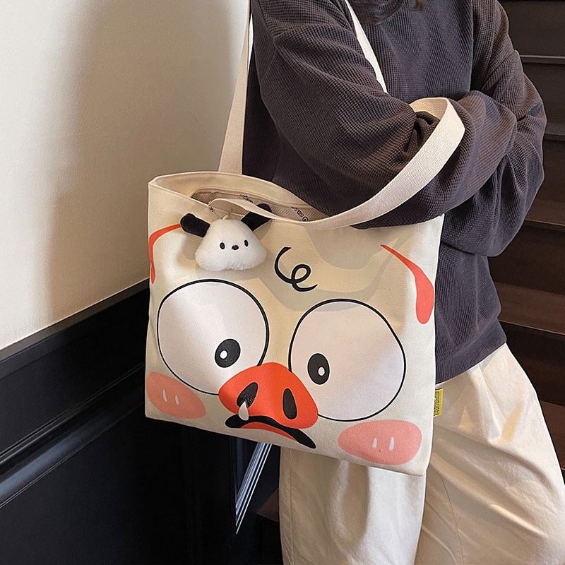 可爱卡通帆布包女2025新款休闲大容量手提袋通勤包学生上课托特包