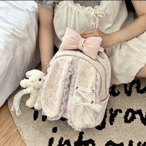 可爱蝴蝶结碎花双肩包包女2026新学生甜美通勤书包大容量旅游背包