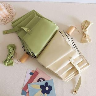 新款直销纯色三折木柄黑胶伞实木晴雨两用伞手动折叠雨伞加固加厚