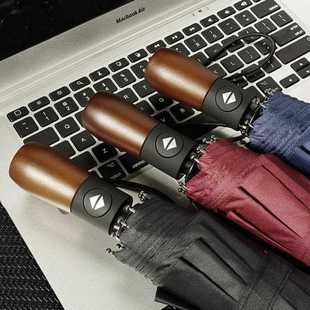 直销新款木柄黑胶伞10十骨全自动雨伞三折叠遮阳商务礼品伞广告lo