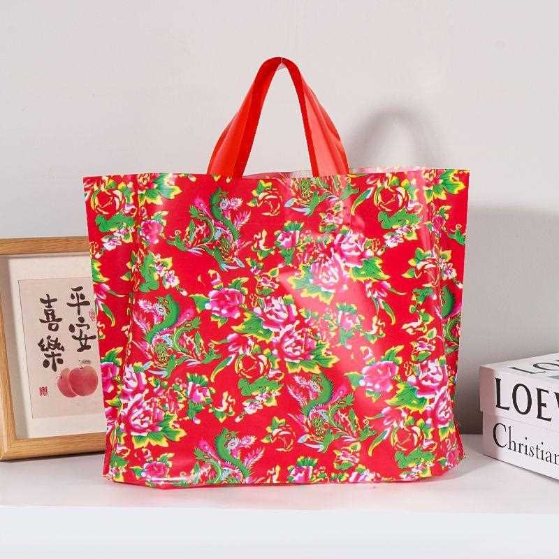 新款直销2024年新年款礼品袋手提袋服装店袋子购物logo男女童装塑