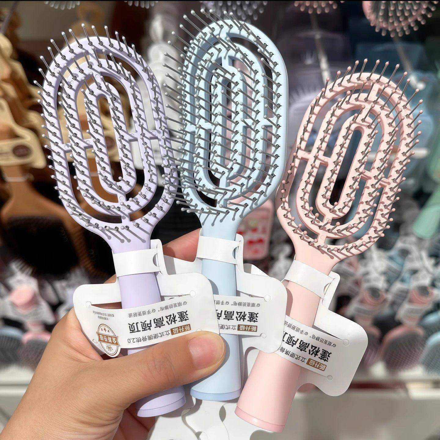 新款镂空创优高颅迷你立式便携排骨梳气囊蓬松排骨按摩气垫梳子