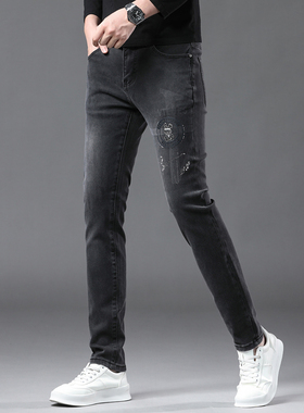 高级欧货灰色印花新款秋季牛仔裤男款小脚修身2025新款潮流男裤子