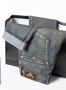 秋冬季2025新款潮牌牛仔裤男士韩版潮流弹力修身小脚高档男装长裤