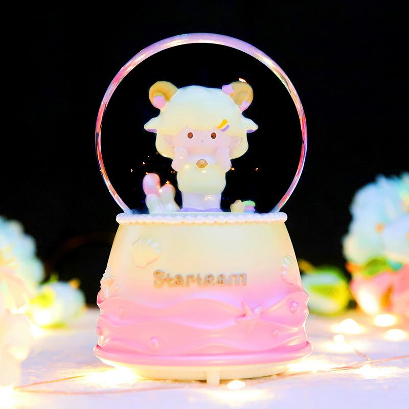直销新款星座天团水晶球飘雪旋转带灯摆件八音盒音乐盒儿童少女生