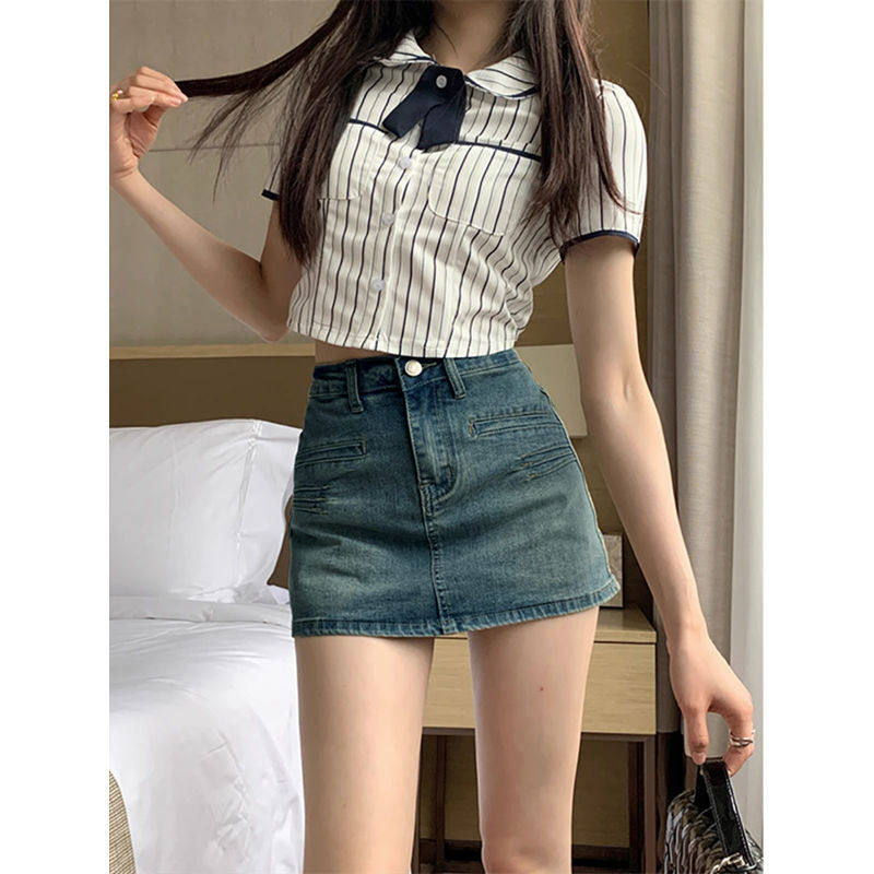 别致口袋牛仔裙高腰女