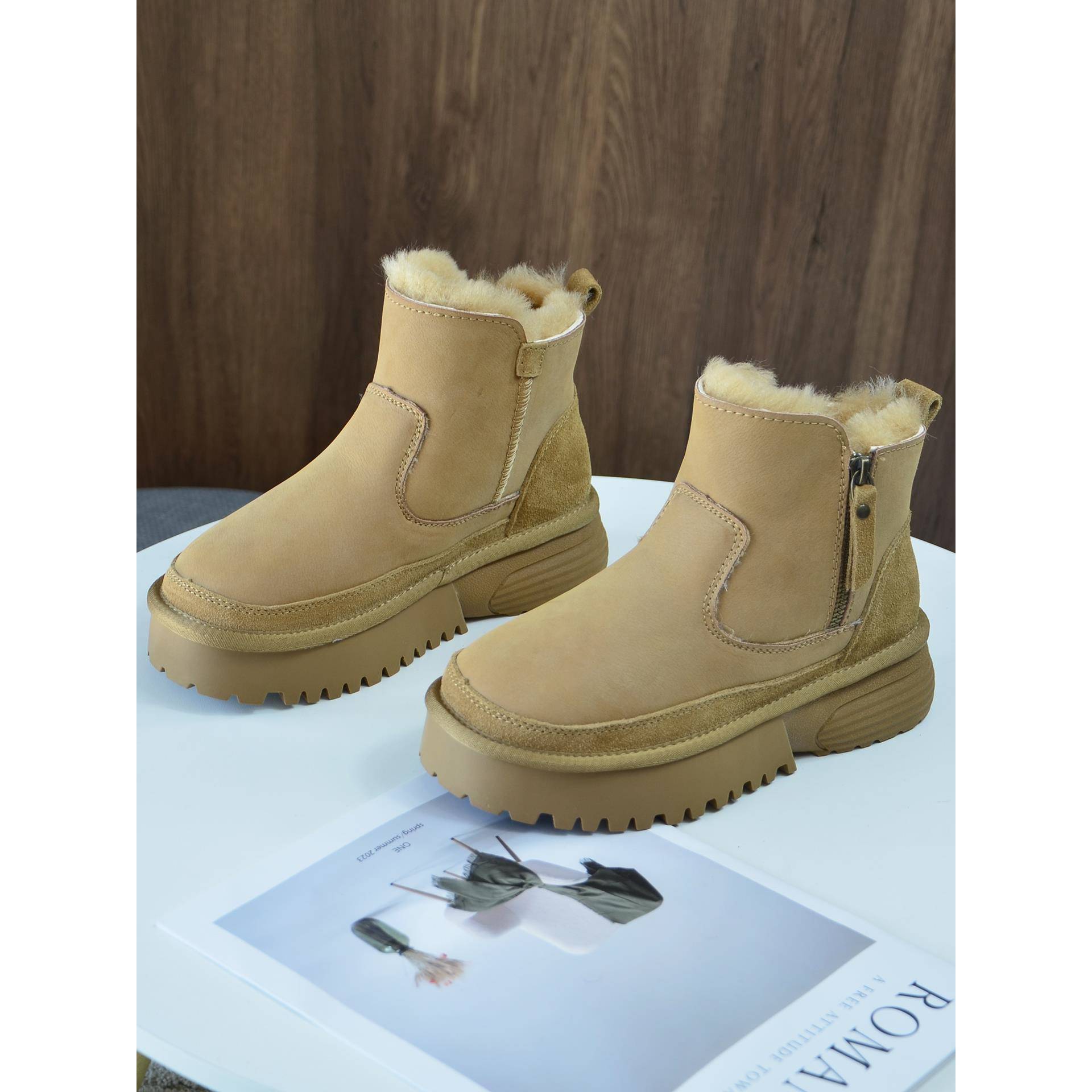 切尔西全羊毛雪地靴女2025新款侧拉炼皮毛一体户外短靴厚底东北鞋