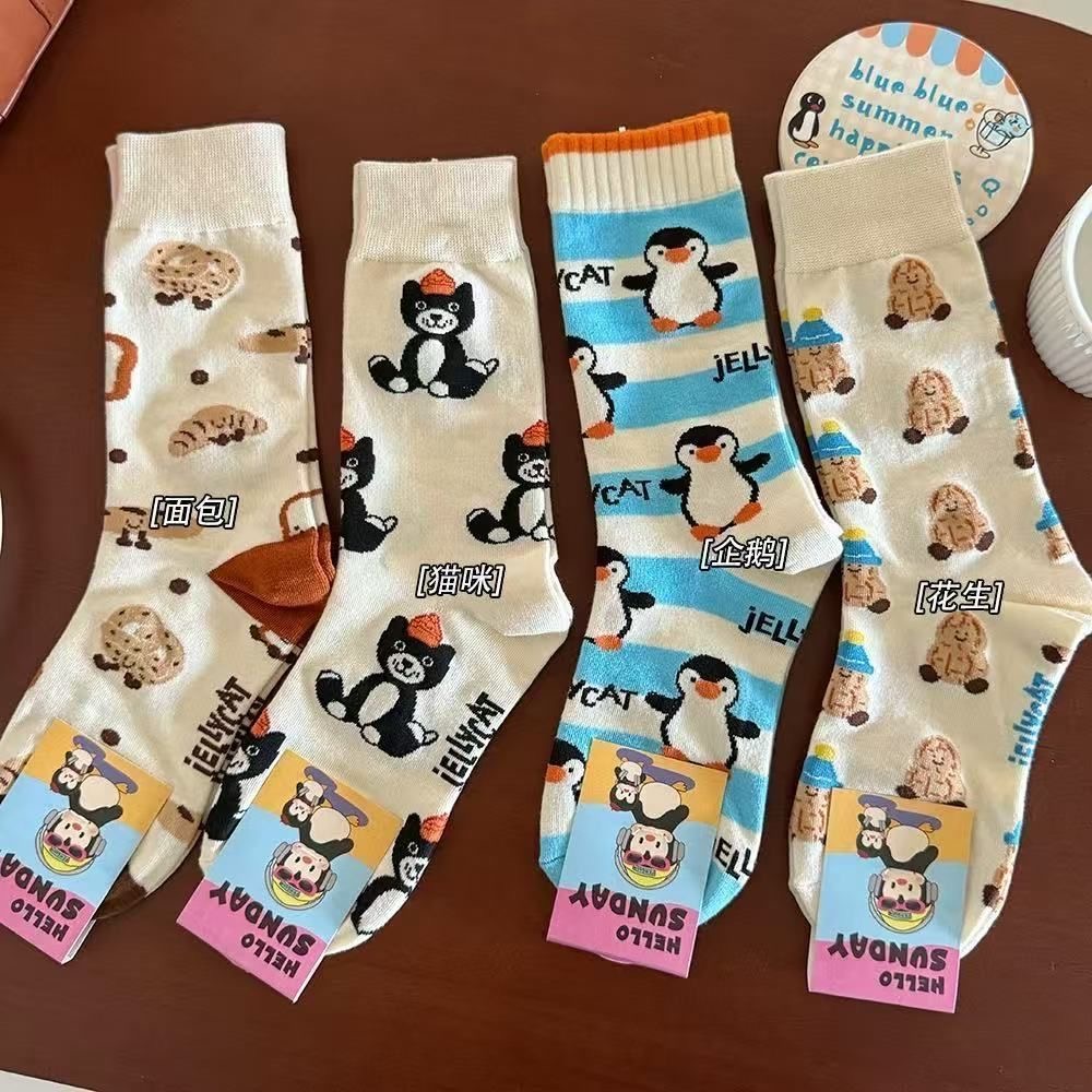 可爱个性卡通袜子女中筒袜春秋款韩版ins潮网红企鹅长袜情侣长袜