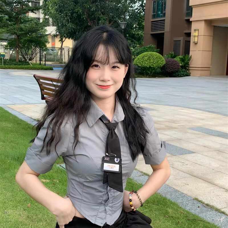 美式校园JK制服套装女夏季2024新款高级感衬衣黑色蓬蓬短裙两件套