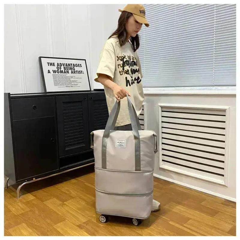 维多利轻奢臻品万向轮旅行包大容量行李包可肩背可拖拉外出旅行出