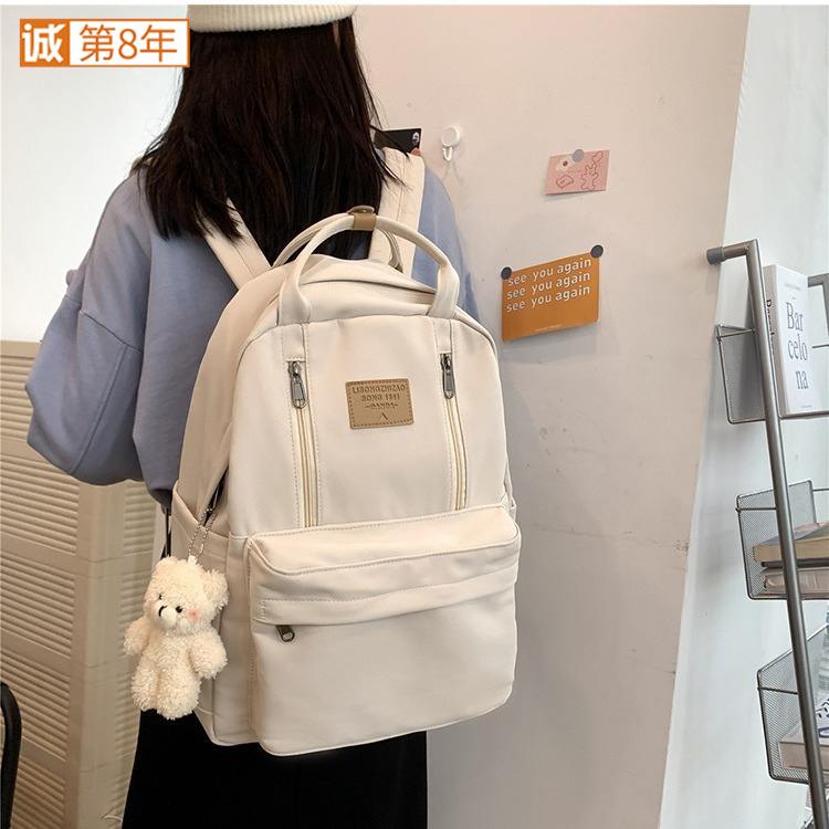 书包女新款韩版ins简约大学生旅游双肩包大容量休闲中学生双肩包