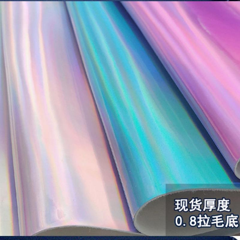 直销新款镭射镜面革幻彩渐变反光银色pu皮革毛底手袋服装饰皮料现
