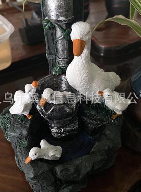 直销新款太阳能鸭子水泵流水款家庭树脂工艺品摆件 鸭子一家树脂